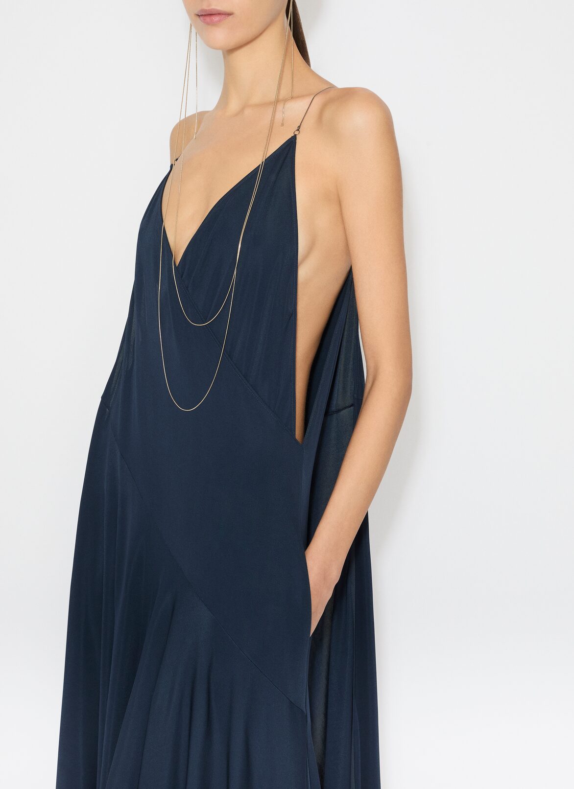 ROBE ASYMÉTRIQUE EN JERSEY MAT ALAÏA ROBE ASYMÉTRIQUE EN JERSEY MAT BLEU FONCÉ